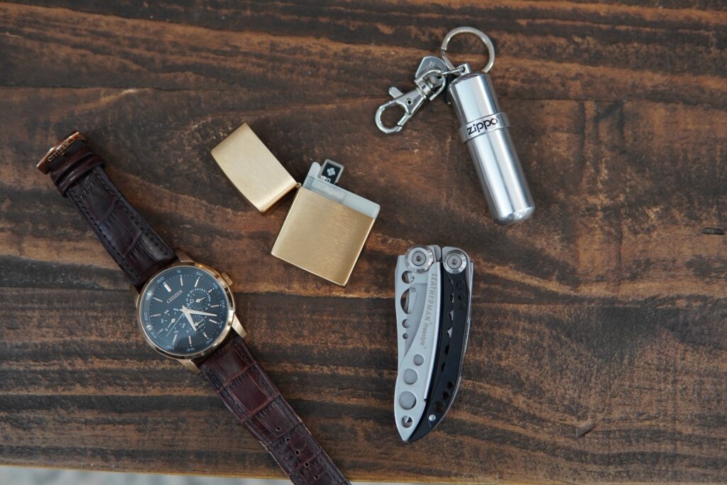 ZippoNode with a watch, knife and keychain for size comparison