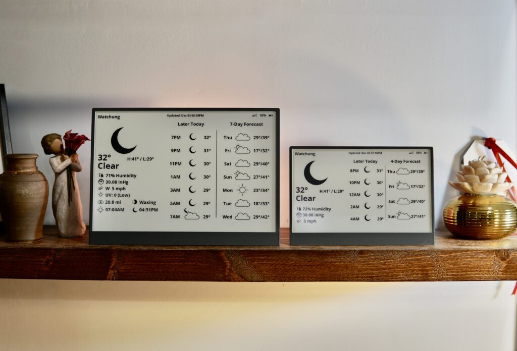 10.2-inch and 7.5-inch UkieLab weather stations side by side on a wooden shelf